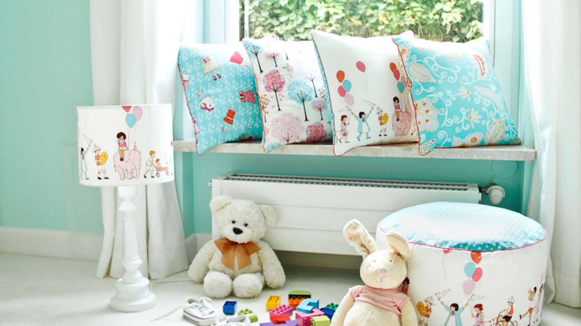 Kolorowe poduszki do pokoju maluszka