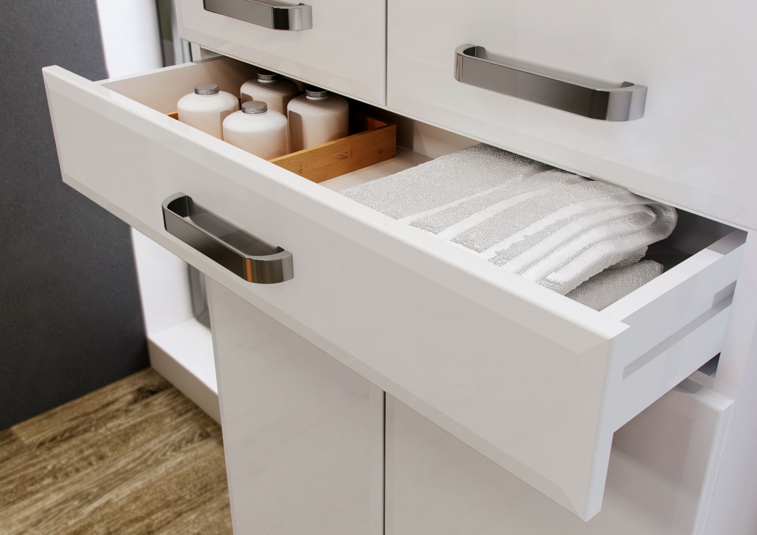 Kolekcja Amigo Elita to zestaw mebli zaprojektowanych z myślą o przechowywaniu. Wysoki słupek oferuje pomysłową szufladę, np. na 
ręczniki. Fot. Elita.