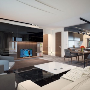 Salon urządzony jest bardzo nowocześnie, ale zarazem przytulnie. Beże i drewno pięknie korespondują z nowoczesnymi meblami wypoczynkowymi. Projekt: arch. Rafał Zdanowicz, arch. Tomasz Siemieniuk. Fot. Archetyp