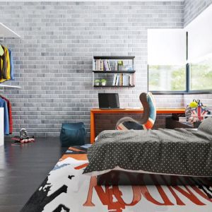 Pokój dla starszych dzieci można urządzić w nieco industrialnym stylu. Cegły na ścianie, ciemna, grafitowa podłoga i surowy klimat dobrze pasują do tego typu wnętrz. Fot. Z500