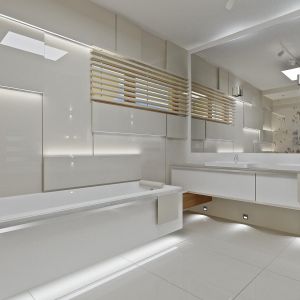 Łazienka, podobnie jak cały dom, urządzona jest nowocześnie, w minimalistycznym stylu. Fot. MG Projekt