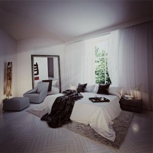 Jedna z sypialni została urządzona w minimalistycznym stylu. Fot. Angel Wawel