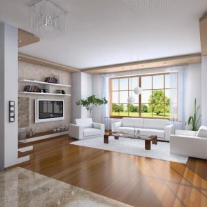Ciemna drewniana podłoga jest dobrym uzupełnieniem białego, nowoczesnego wnętrza. Fot. MG Projekt