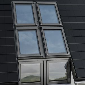 Okna IKDU I3 marki Okpol dzięki zespoleniu z oknem dachowym zwiększają powierzchnię przeszklenia pozwalając oświetlać wnętrza naturalnym światłem. Fot. Okpol