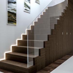 Eleganckie schody pełnią nie tylko funkcję praktyczną, ale także dekoracyjną. Fot. HomeKONCEPT 41