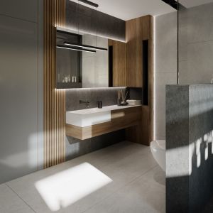W nowoczesnej łazience zdecydowano się na drewniane elementy wykończeniowe, nawiązujące do reszty pomieszczeń. Fot. HomeKONCEPT