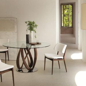 „Infinity” - stół i stolik okolicznościowy zaprojektowany dla firmy Porada. Fot. Porada.