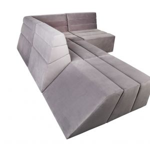 Sofa "Mon" to ciekawa geometryczna forma zamknięta w meblu. Fot. Stylhen