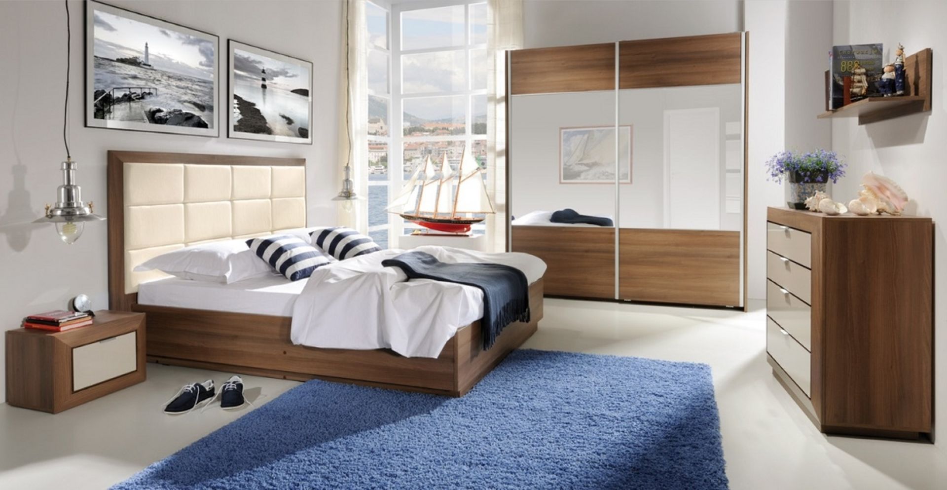 Podzielone na charakterystyczne prostokąty tapicerowane wezgłowie łóżka 