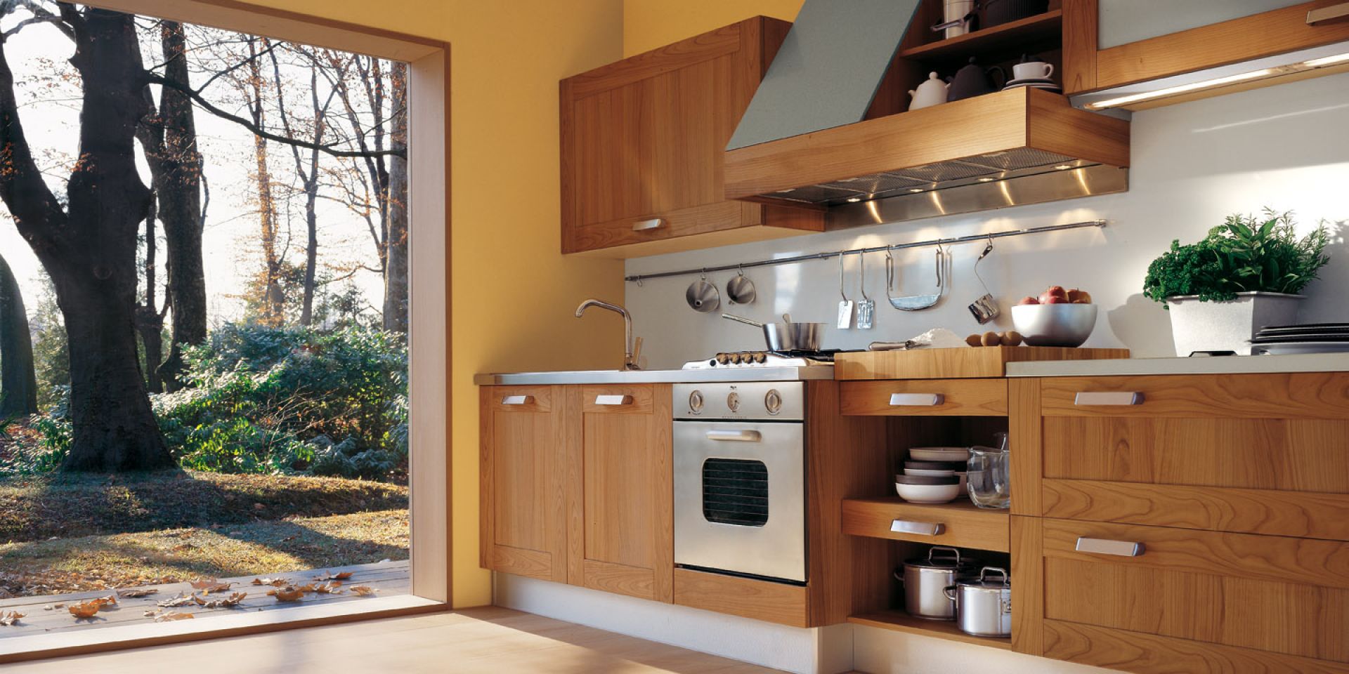 Stylowe kuchnie znakomicie łączą się z  nowoczesnym sprzętem kuchennym. Na zdjęciu kuchnia 