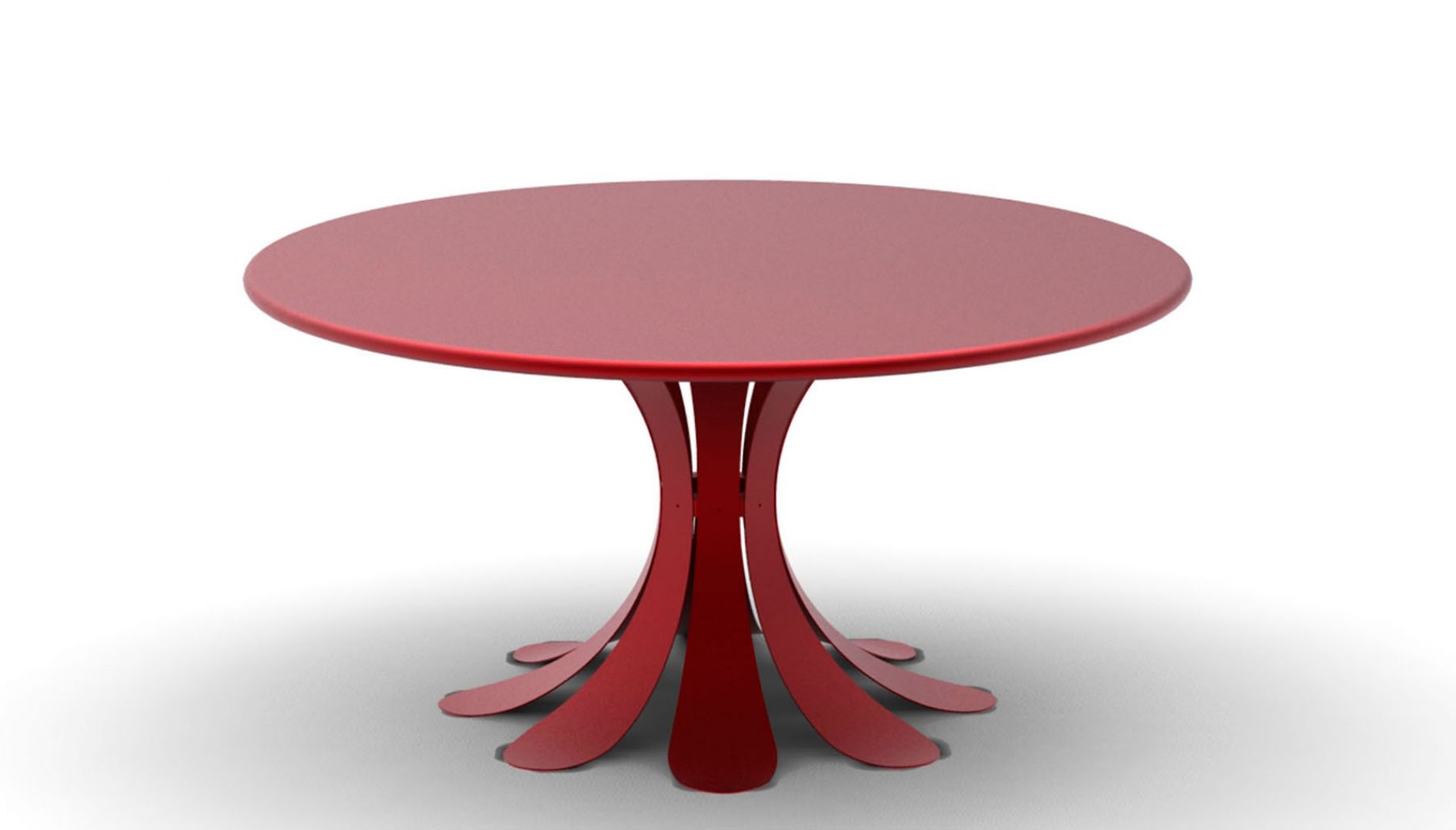 Czerwony stolik De Repas Fleur kształtem przypomina kielich kwiatu. Fot. KSL Living 