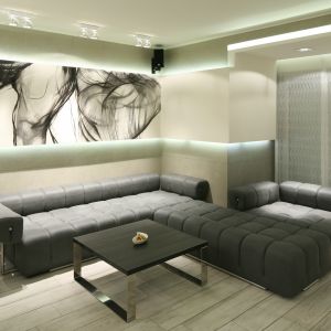 Modułowe sofy można układać według własnych upodobań. W tym wnętrzu sofa biegnie wzdłuż ściany. Projekt: Dominik Respondek. Fot. Bartosz Jarosz