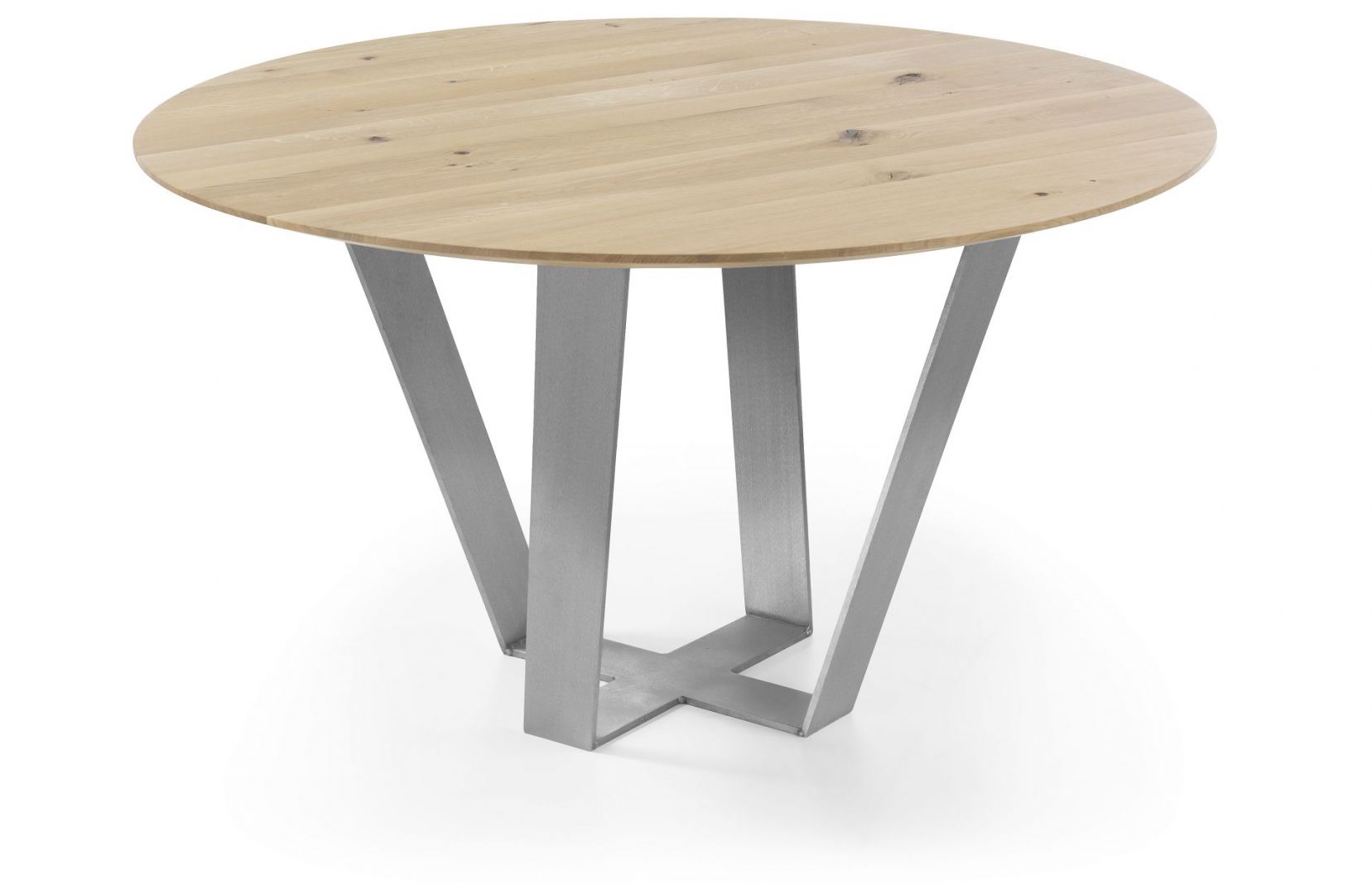 Okrągły stół Sonoro, wykonany z drzewa dębowego, o delikatnym ubarwieniu. Nogi będące podstawą stołu, wykonane są z efektownego matowego metalu. Fot. Congrazio