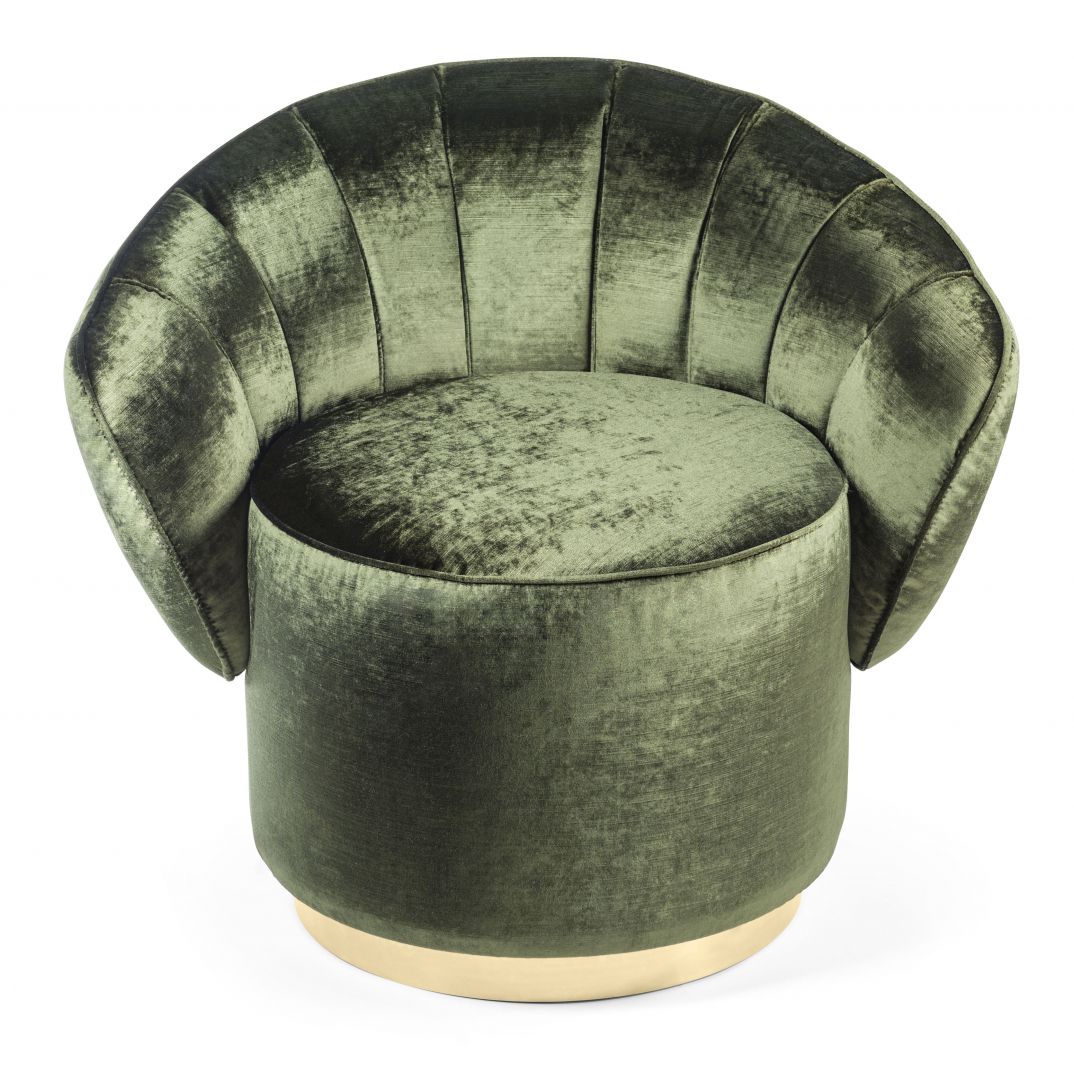 Fotel Kidman w najmodniejszym kolorze zielonym. Rozłożyste oparcie zapewnia komfort siedzenia.  Fot. VG 