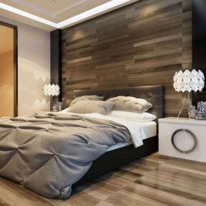 Drewno to doskonały sposób na modną i ciepłą sypialnię. Można go stosować jako dodatek lub w formie mebli. Fot. Janpol