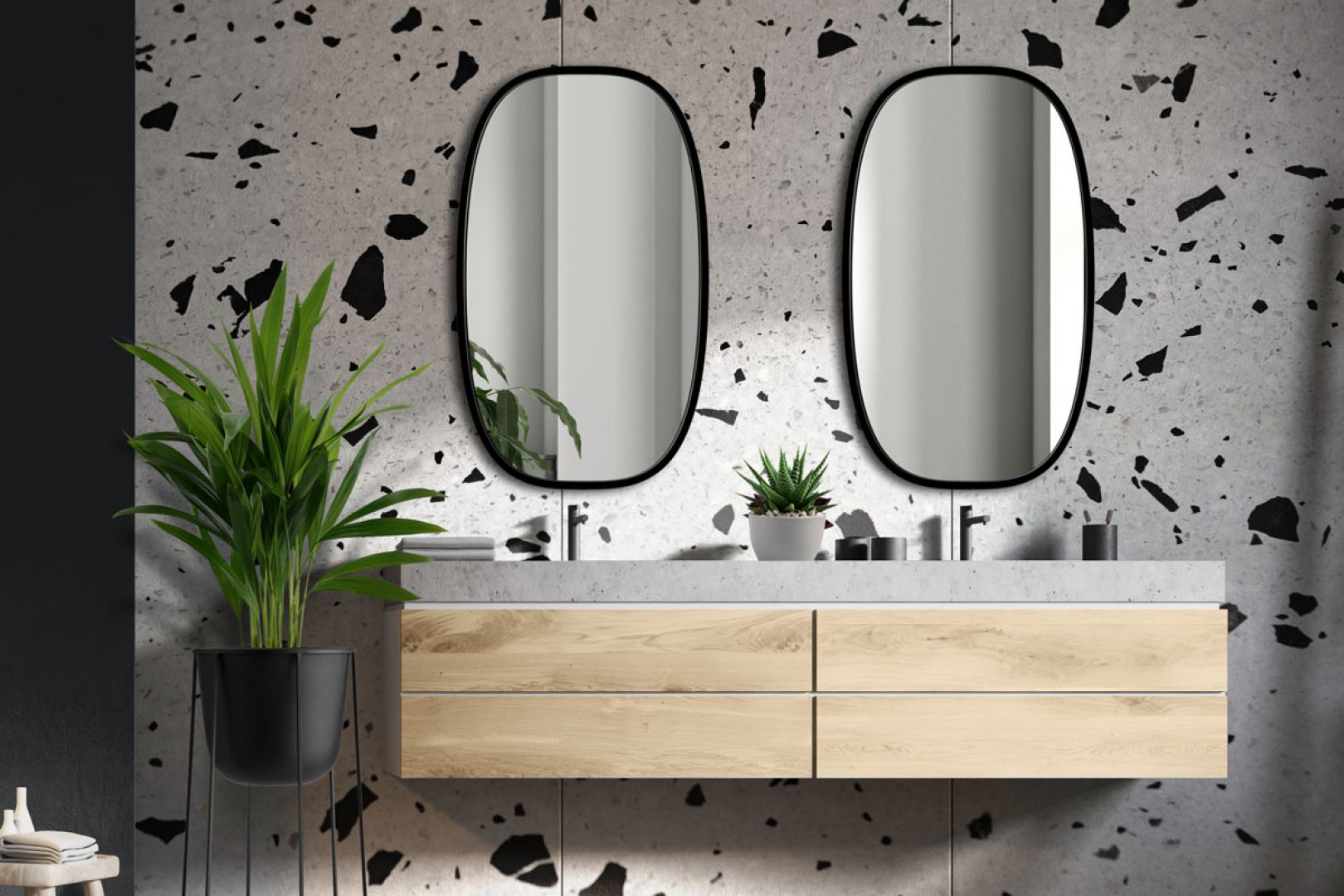 Owalne lustro w cienkiej czarnej ramce Dolio. Fot. GieraDesign