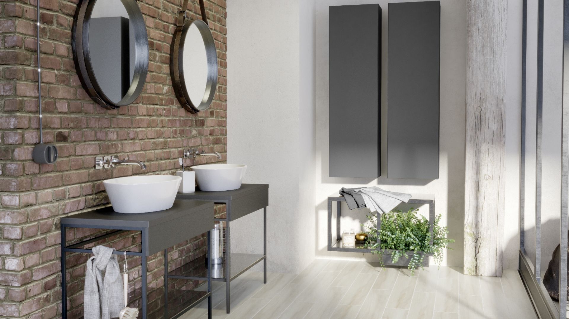 Łazienka w stylu industrialnym według marki Opoczno. Kolekcja łazienkowa Splendour z meblami w matowym, grafitowym kolorze wspartych na metalowych nóżkach. Świetnie prezentują się na tle czerwonej cegły. Fot. Opoczno