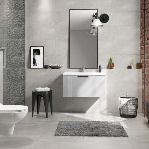Łazienka w stylu loft z cegłą, metalowymi dodatkami i płytkami z kolekcji Normandie marki Cersanit. Fot. Cersanit