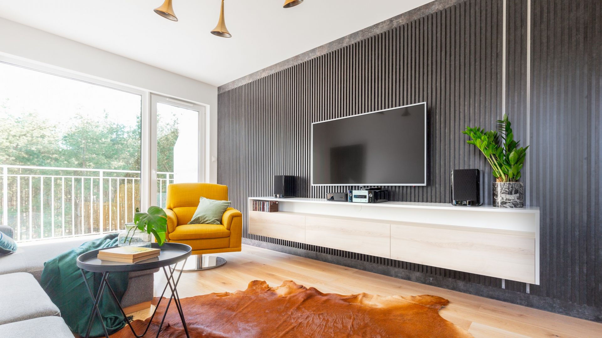 Co na ścianę w salonie? 20 sprawdzonych pomysłów architektów wnętrz. Projekt gama design współ Joanna Rej fot Pion Poziom