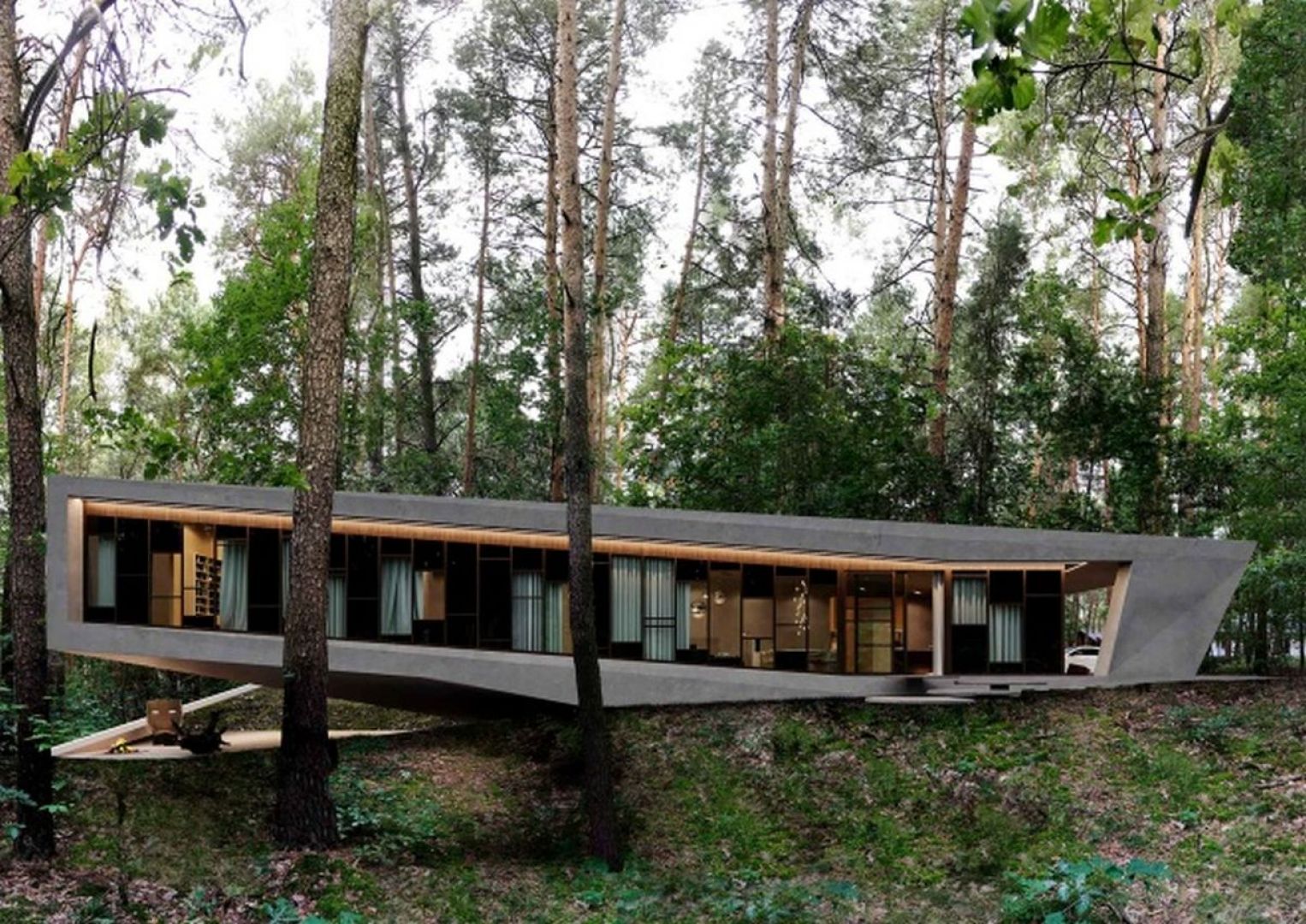 Budynek z zewnątrz sprawia wrażenie piętrowego, choć w istocie ma tylko jedną kondygnację. Projekt: Marcin Tomaszewski, pracownia REFORM Architekt