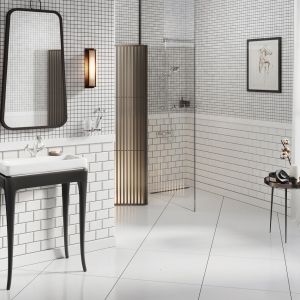 Do wystroju dopasowano bardzo oryginalną armaturę. To chromowana bateria z serii Retro New, stylizowana na dawne modele z charakterystycznymi dwoma pokrętłami. Fot. Ferro