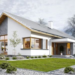 Dom łączy tradycyjną bryłę z nowoczesnymi materiałami wykończeniowymi i detalami. Projekt: arch. Michał Gąsiorowski. Fot. MG Projekt