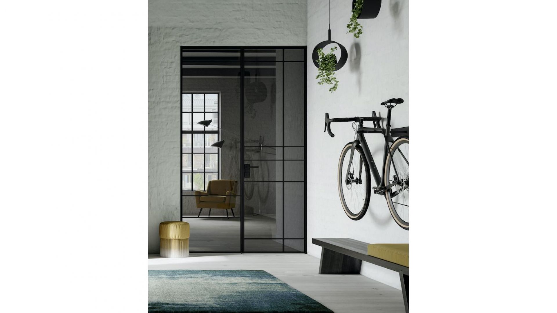 Drzwi Swing Door Slim Line mają ramę z anodyzowanego aluminium, która z wypełnieniem z przezroczystego lub przyciemnianego szkła, zapewnia duży dostęp światła do pomieszczenia. Fot. Raumplus