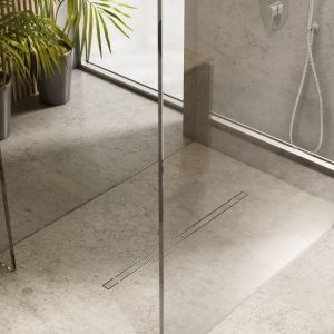Znakiem minimalizmu w łazience są również elementy wyposażenia, które można ukryć pod tynkiem lub w podłodze. Fot. Schedpol