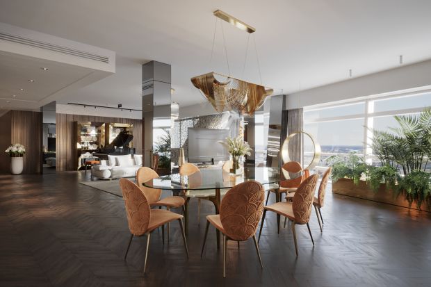 W tym wnętrzu spotykają się elementy art deco z nowoczesnymi detalami. Ciepłe kolory ziemi pięknie łączą się z naturalnymi materiałami i graficznymi akcentami. Apartament na Złotej 44 w Warszawie to przestrzeń dla wielbicieli luksusowych mare