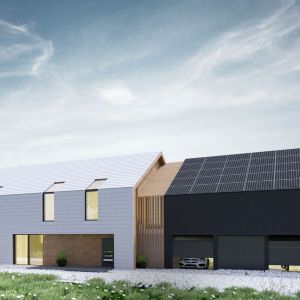 Budynek został zaprojektowany jako połączenie dwóch brył o takich samych proporcjach elewacji szczytowych z cofnięciem jednej części względem drugiej. Projekt: Duch Projektanci


