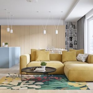 Żółta sofa w jasnym, przytulnym salonie prezentuje się wyjątkowo efektowanie. Projekt i wizualizacje: Mateusz Limanówka, Spacja Studio