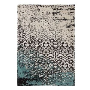 Wielokolorowy dywan matar nawiązuje do estetyki vintage. Rozmiary: 160x230 cm. Cena: 1072 zł. Sprzedaż: 9design.pl
