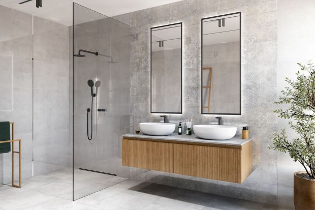 Podoba ci się łazienka w stylu loft, ale jednocześnie przytulna i ciepła? Ta aranżacja spełnia te oczekiwania! Zobacz ciekawy pomysł na łazienkę z rysunkiem betonu na ścianie. To płytki polskiej marki!