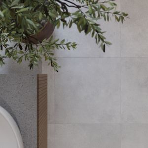 Nowoczesna łazienka z motywem betonu. W projekcie zastosowano płytki z kolekcji Concrete marki Ceramica Bianca. 