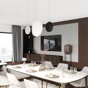 Na ścianie w kącie telewizyjnym są takie same materiały co w kuchni, czyli marmur i drewno. Projekt i wizualizacje: Pracownia Architektoniczna MGN