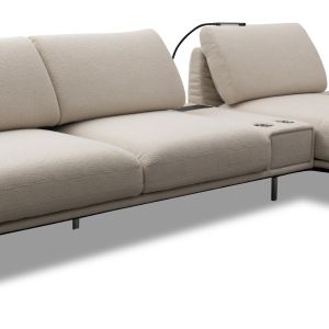 Nowoczesna sofa w tkaninie boucle - modny pomysł do salonu. Fot. mat. prasowe Kler