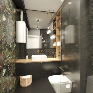 W niewielkiej łazience jest wszystko, co potrzebne do wygodnego z niej korzystania. Zmieściła się także pralka i są pojemne schowki (w szafkach powieszonej na ścianie i pod umywalką oraz na półkach).  Projekt: Małgorzata Górska-Niwińska z Pracowni Architektonicznej MGN.