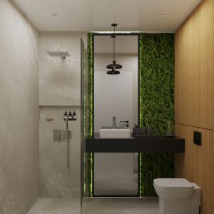 Dużo tu drewna i gresu do złudzenia przypominające marmur. Jednak najbardziej naturalnym elementem jest zielona ściana z mchu. Te rośliny w łazienkach czują się znakomicie, chłonąc wilgoć z powietrza, tak że nie trzeba ich podlewać. 