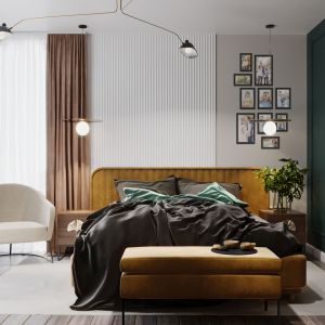 Wygodna sypialnia z pojemną szafą z zielonymi frontami. Projekt wnętrza: MIKOŁAJSKAstudio
