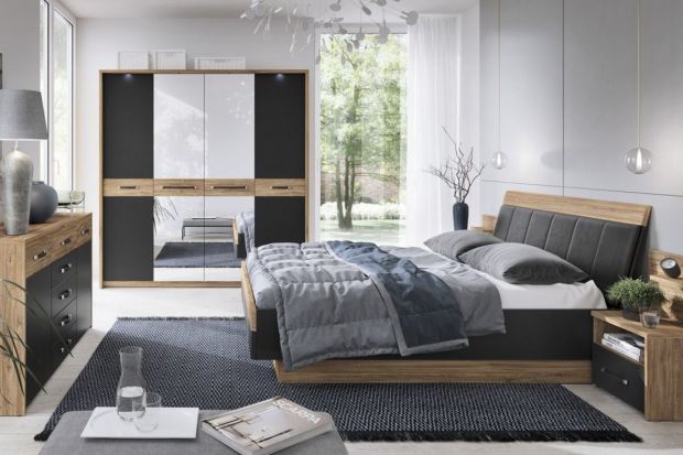 Jakie meble do sypialni wybrać? Szukasz inspiracji? Zobacz elegancką kolekcję mebli pięknie łączącą kolory czarny z drewnem.