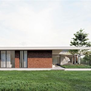 Biel ramy kontrastuje z ceglaną elewacją domu, który wygląda jakby był włożony do środka. Projekt domu: pracownia Core