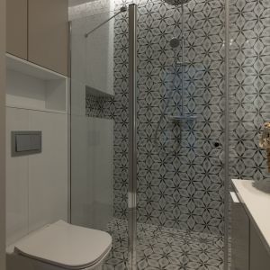 W łazience znajduje się kabina prysznicowa z odpływem zamontowanym w podłodze. Projekt wnętrza i zdjęcie: KODO Projekty i Realizacje Wnętrz