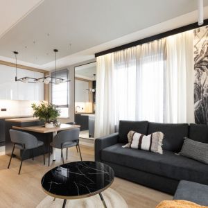 Mały salon w nowoczesnym stylu. Projekt wnętrza: Paweł Ślęzak, pracownia Architaste. Fot. Dominika Wilk