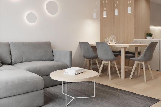 Mieszkanie o powierzchni 94 metrów znajduje się w Chorzowie. Jest wygodne i funkcjonalne. Doskonale łączy minimalistyczne wzornictwo z przytulnym klimatem. Wnętrze, dzięki subtelnej kombinacji bieli, szarości i drewna jest też niezwykle eleganckie