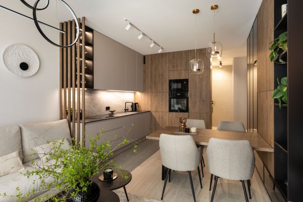 Kuchnia z salonem to najpopularniejszy układ mieszkania w bloku. Jak urządzić otwartą część dzienną? Sprawdź, jak salon i kuchnię zaprojektowali polscy architekci wnętrz!
